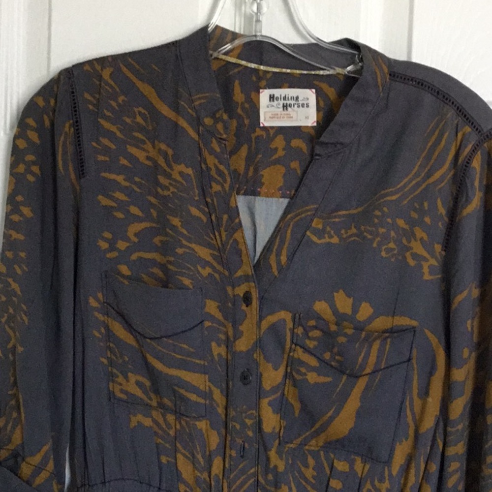Holding Hermes size xs